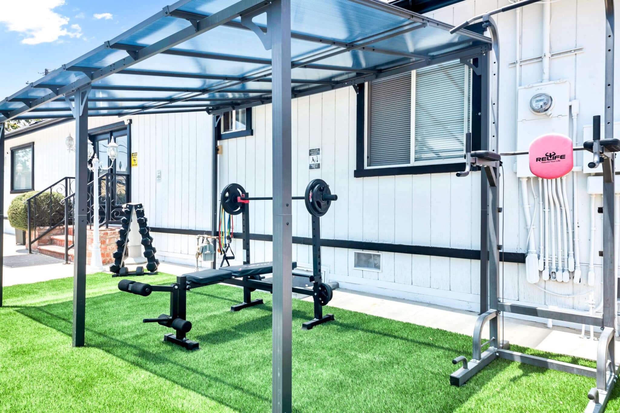 Outside gym and weight training facility at Northridge Addiction Treatment Center